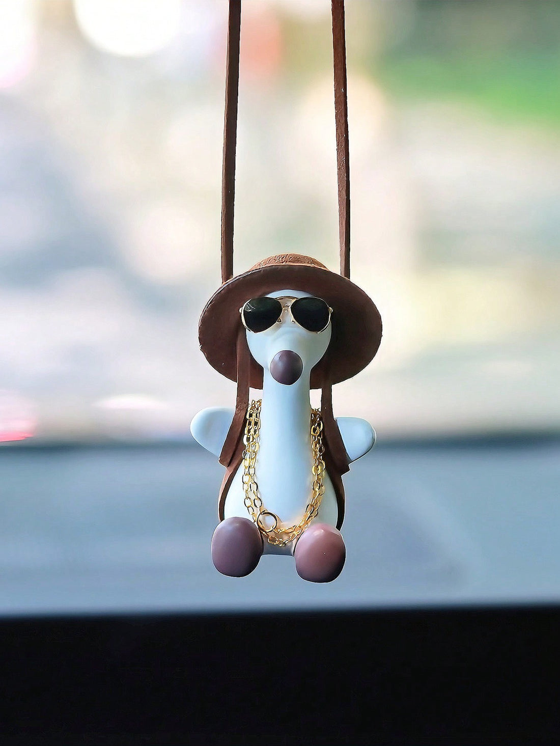 Add some charm and flair to your ride with the Charming Flamingo Car Rearview Mirror Pendant. This elegant pendant features a playful flamingo design, adding a touch of personality to your car. Crafted with high-quality materials, it is sure to last and make a statement. Bring some fun to your daily commute with this stunning accessory.