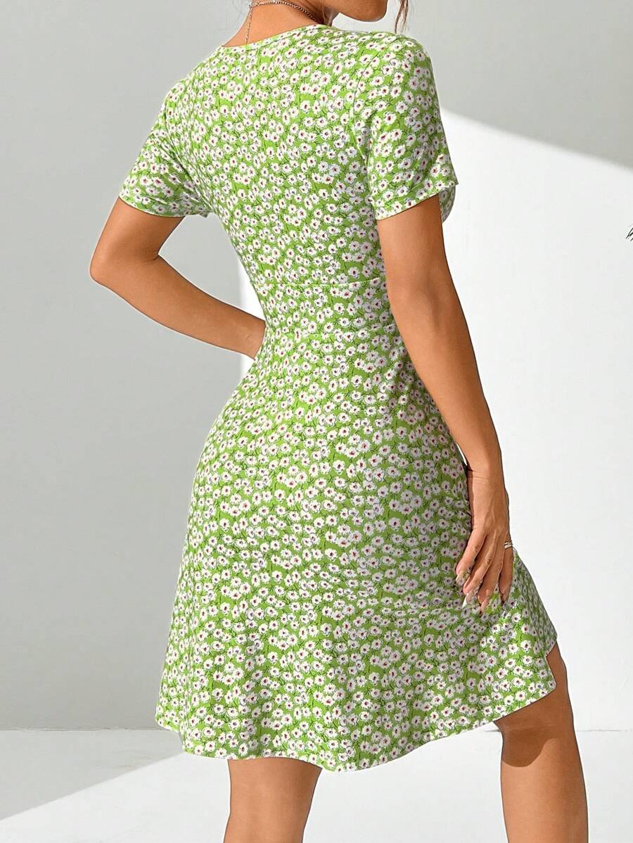 Get ready to turn heads this summer in our Chic Summer Dress for Women! With a flirty Deep V-Neck and charming Ditsy Floral print, you'll be the talk of the town in this stylish short sleeve Holiday Attire. Whether you're hitting the beach or attending a BBQ, this dress is the perfect combination of chic and comfortable.