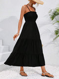 Black smocked bodice tiered maxi sundress with flowy A-line skirt