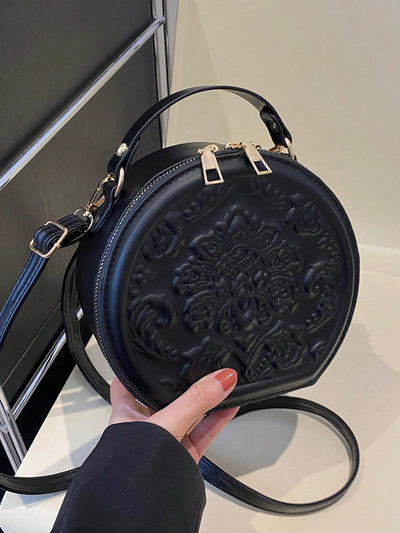 Vintage Flower Embossed Round Handbag: The Chic Commuter's Essential