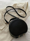 Vintage Flower Embossed Round Handbag: The Chic Commuter's Essential