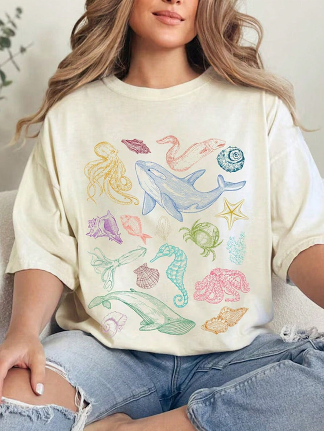 Introducing Summer Vibes: Ocean Life Printed Round Neck T-Shirt for Women, perfect for embracing the warm weather with style and comfort. Made from high-quality material and featuring a unique ocean life print, this shirt is a must-have for all women looking to add a touch of vibrancy to their summer wardrobe.