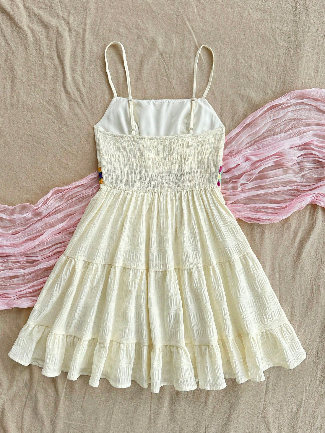 Add a touch of whimsy and retro charm to your summer wardrobe with our Effortlessly Chic dress. Featuring a flattering A-line silhouette and delicate crochet patchwork, this dress is perfect for any summer occasion. Bring a vintage-inspired flair to your style with this must-have dress.