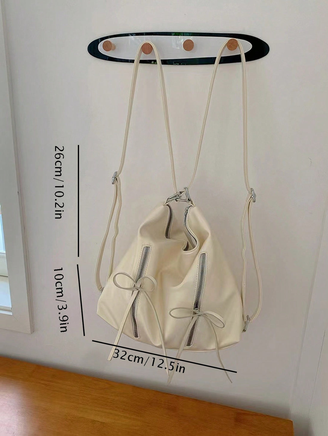 Elevate your style with our Chic Bow Knot Backpack. This fashionable Korean tote bag is perfect for daily adventures. With its unique bow knot design, it adds a touch of sophistication to any outfit. Lightweight and spacious, it's the ultimate accessory for both fashion and function.