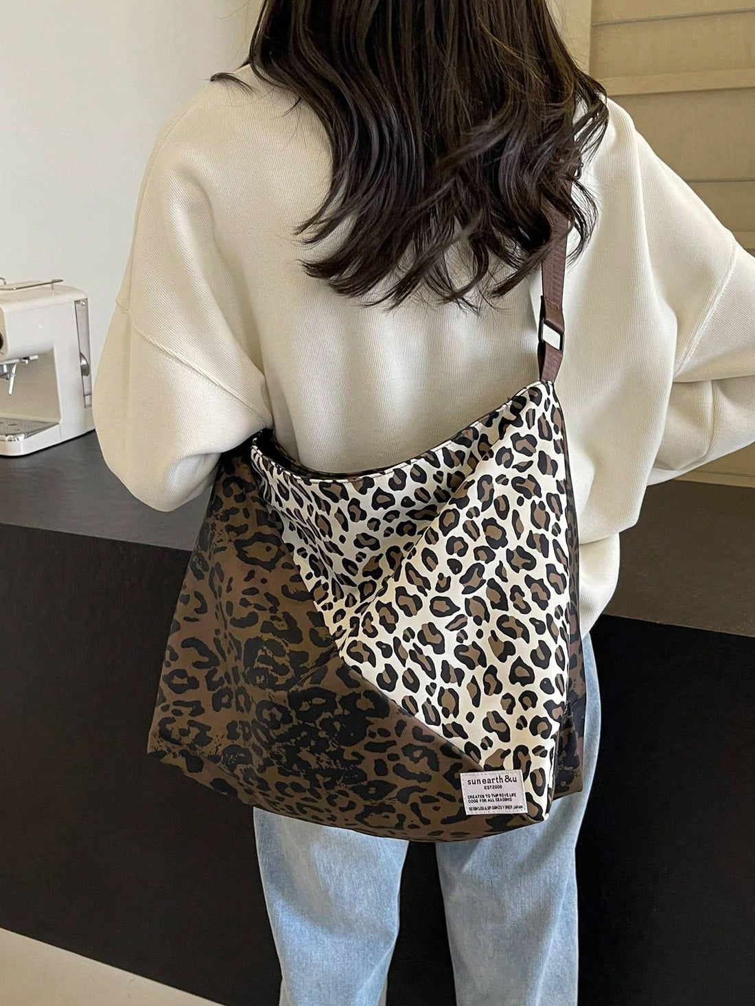 Make a statement with our Chic Leopard Print Shoulder Bag. Crafted with trend-setting design, this bag is the ultimate fashion accessory. Featuring a fierce leopard print, it adds a touch of style to any outfit. Expertly made with quality materials, it's both fashionable and functional. Elevate your look with this must-have bag.