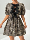 Chic Leopard Print Half-Sleeve Dress with Bow Tie Detail