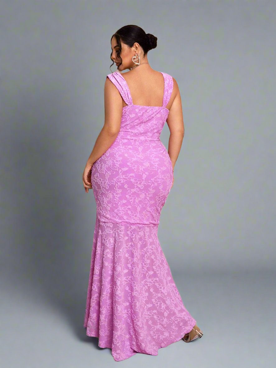 Add a touch of femininity to your summer wardrobe with our Pretty in Pink plus size ruffled pencil dress. Flattering and comfortable, this dress is perfect for all your sweet summer days. Embrace your curves and show off your style with confidence. Available in a range of sizes.