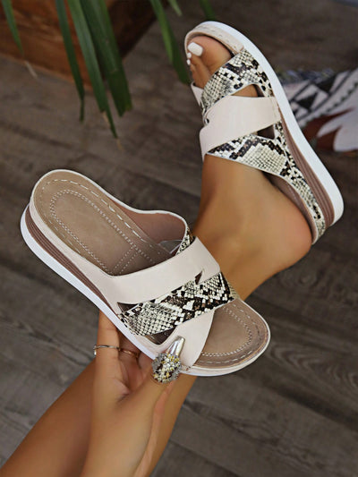 Elevate your summer style with our Animal Print Wedge Sandals! These lightweight sandals feature knitted details for a stylish touch. Perfect for any summer outfit, these sandals will add a fun and trendy element to your look. Experience a comfortable and fashionable summer with our Animal Print Wedge Sandals.