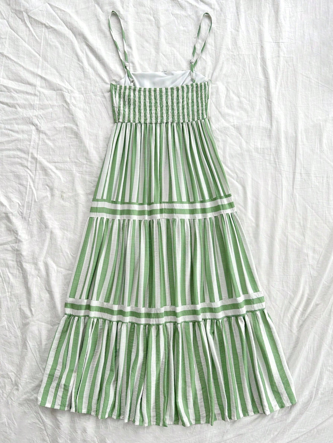 Revamp your summer wardrobe with our Chic Summer Stripes dress by Dreamara! This A-Line dress in green and white is perfect for any casual outing. Its chic stripes add a touch of playfulness to your overall look, while the comfortable A-Line design keeps you cool and stylish all day long. Say goodbye to boring summer outfits and spice up your fashion game with Dreamara!