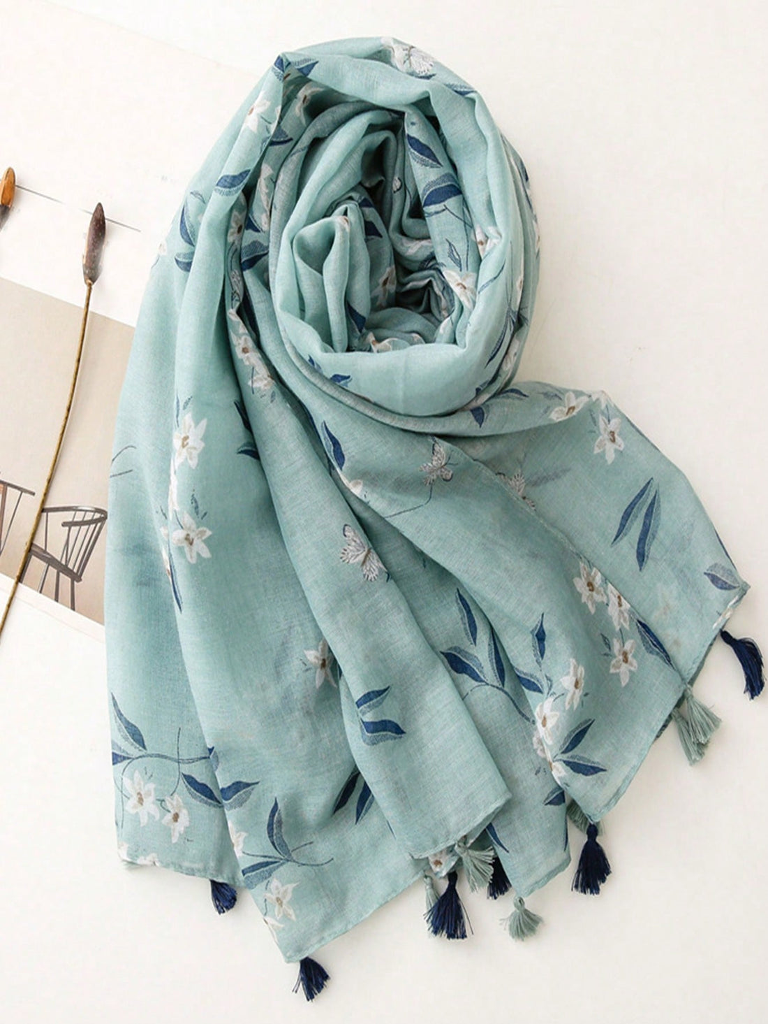 Introducing the Sunny Bohemian Charm scarf - a lightweight and stylish accessory for women on the go. Perfect for sunny days, it provides sun protection and can be worn as a scarf or cover-up during travel. Stay chic and protected with this versatile tassel scarf.