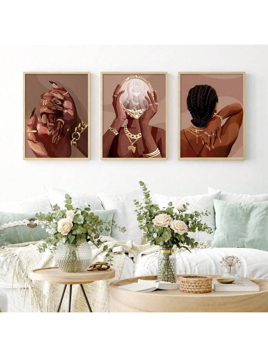 Living room wall mockup of three terracotta female figure prints in slim black display frames