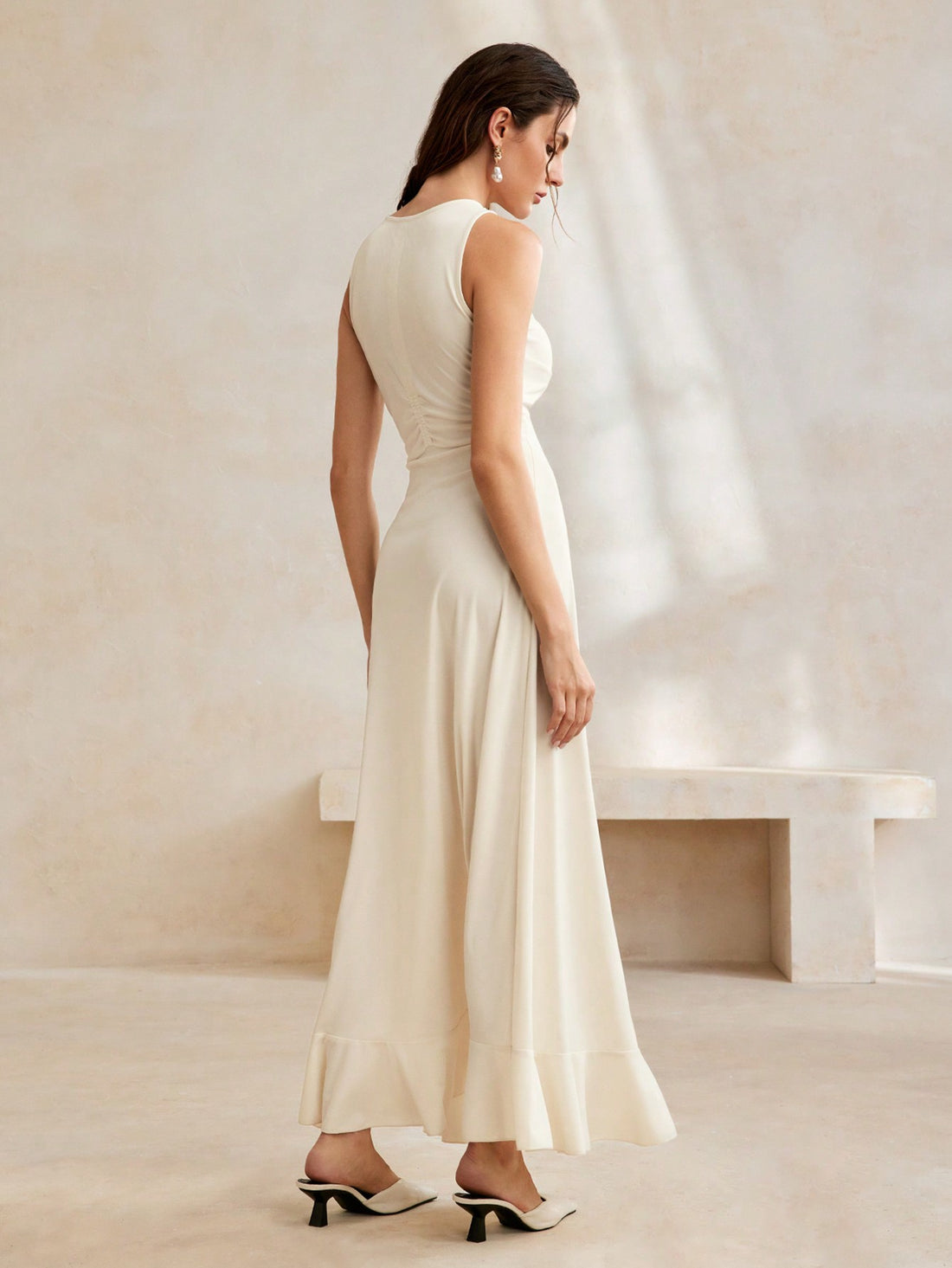 Get ready to turn heads in our Elegant Korean Style Halter Neck Pleated Ruffled Evening Gown! This stunning gown boasts a unique, playful design that will make you stand out at any event. The halter neck adds an elegant touch while the pleated ruffles add a fun twist. Perfect for a night out or a special occasion.