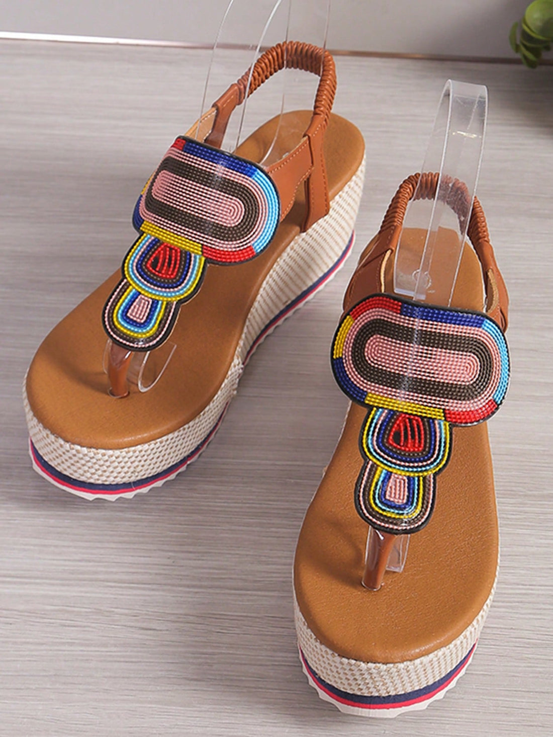 Elevate your style game with Colorful Patchwork Wedge Sandals. These vibrant and chic sandals are the perfect addition to your footwear collection. Featuring a stylish patchwork design, they add a playful touch to any outfit. The wedge heel provides comfortable height, making these sandals perfect for any occasion.