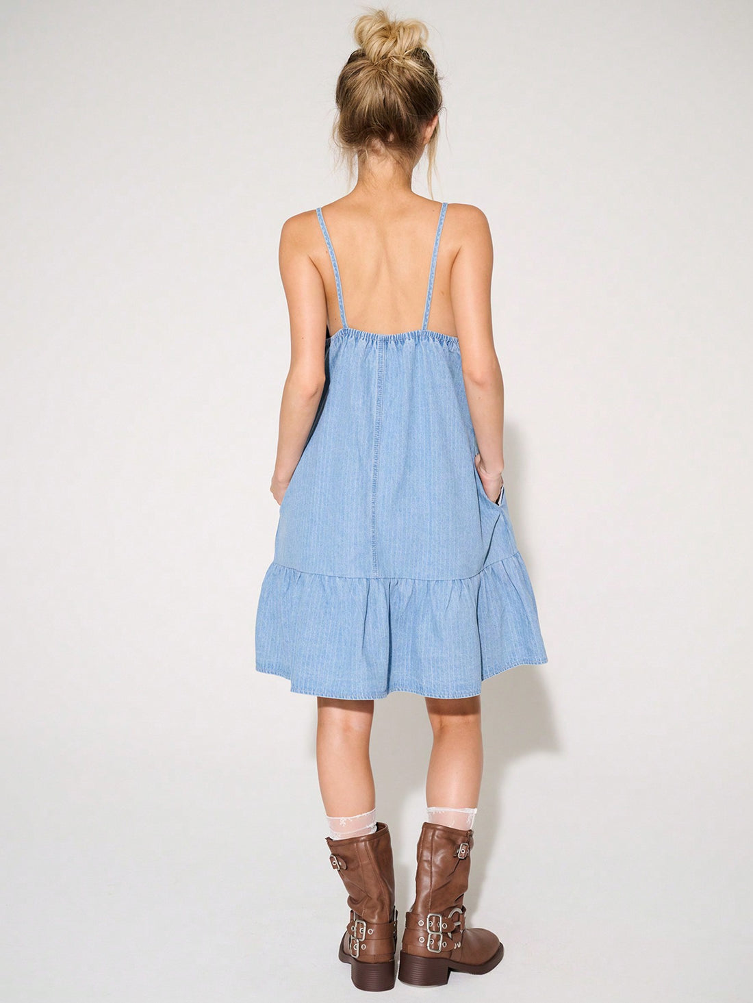 Unleash your inner fashionista with the Westfade Perfection: Bow-Detail Denim Summer Mini Dress. Made with high-quality denim and featuring a stylish bow detail, this dress is perfect for any summer occasion. Its comfortable and flattering fit will make you feel confident and effortlessly chic.