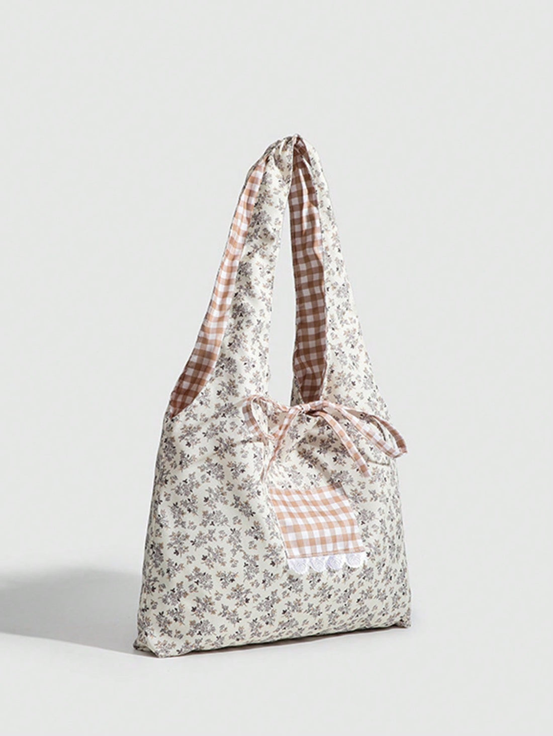 Stay organized and stylish with the Chic Floral Canvas Vest Bag. Crafted for the literary and artistic academy style, this accessory features a durable canvas construction and chic floral design. Keep your essentials close and your look on point.