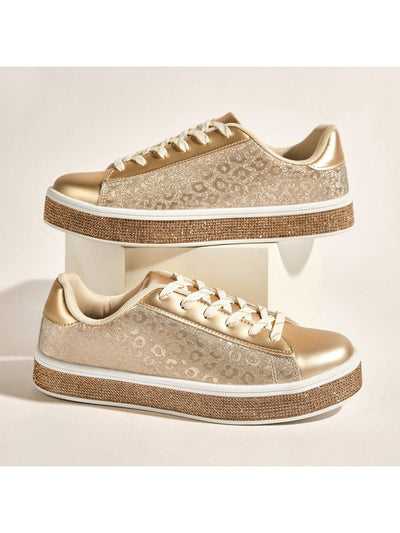 Elevate your sneaker game with our Glitter Meets Leopard: Sparkly Rhinestone Tennis Sneakers. The perfect blend of glam and sport, these sneakers feature sparkling rhinestones and fierce leopard print. Make a statement and stand out from the crowd with these eye-catching sneakers.