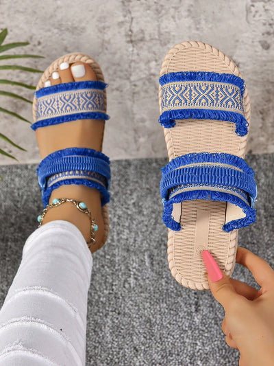 Expertly crafted with a comfortable round toe and stylish blue woven tassels, our Bohemian Bliss sandals are perfect for your next travel or vacation. The flat design provides versatility and the woven tassels add a unique touch. Upgrade your warm weather wardrobe with these must-have sandals.