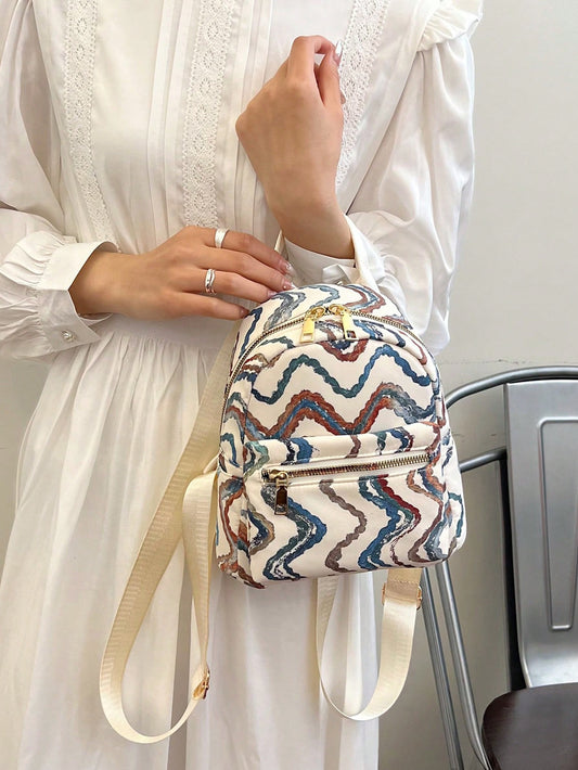 This chic and stylish printed backpack is a must-have new arrival. Its tassel detail adds a touch of sophistication while the backpack's design is both fashionable and functional. With this backpack, you'll look on-trend and be prepared for all your daily adventures.