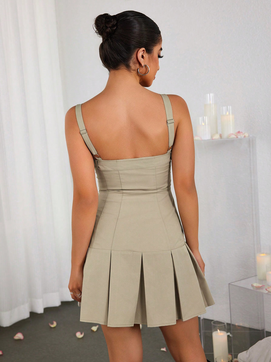 Expertly crafted for a sleek and flattering fit, this Pleated Bodycon Cami Dress will elevate your style. With its removable belt at the neckline, you can customize your look to effortlessly flow from day to night. Made with quality fabric, this dress offers both comfort and sophistication.