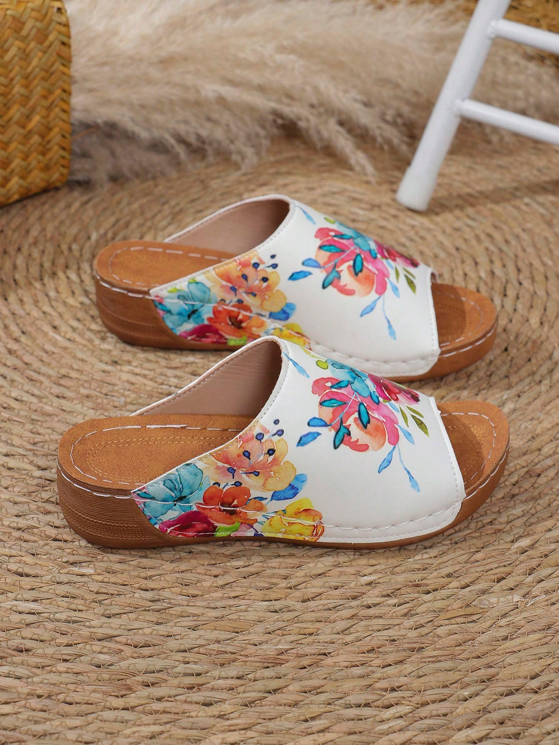 Elevate your summer style with our Chic Floral Printed Flat Sandals. Featuring a stylish and trendy floral print, these sandals are the perfect addition to any outfit. The flat design provides all-day comfort, making them a must-have for your summer wardrobe.