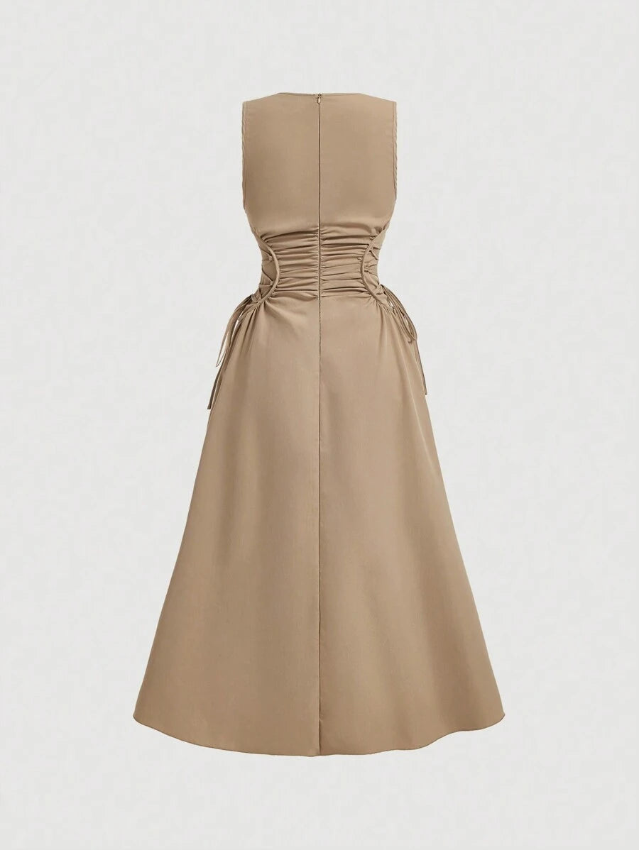 Back view of khaki midi dress with structured bodice and full skirt