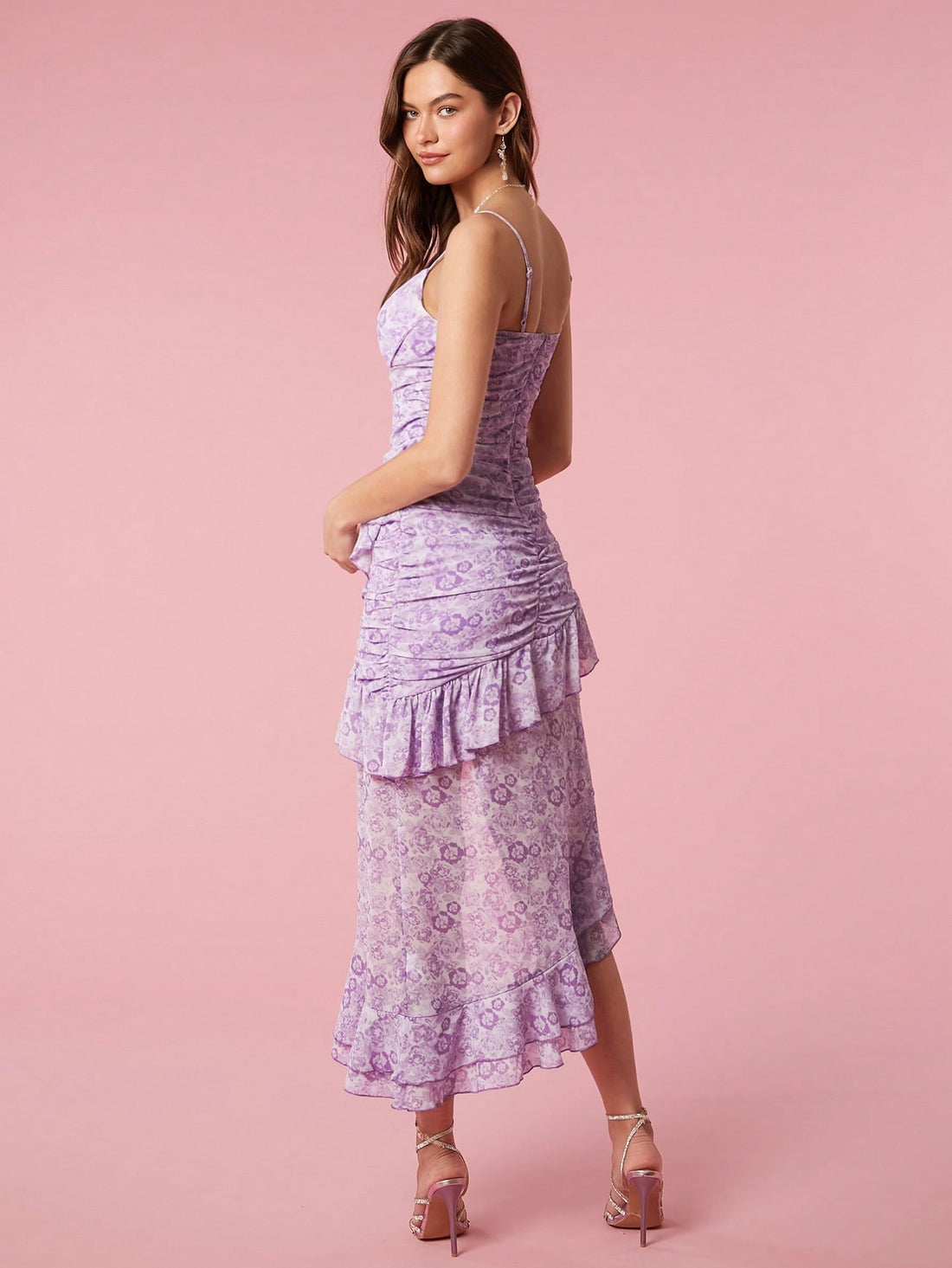 Be a summertime stunner in our Chic & Flowy dress! With vibrant digital prints and spaghetti straps, this asymmetrical dress is perfect for any occasion. Slip it on and let the flowy fabric and playful design make you the talk of the town. Twirl away, girl!
