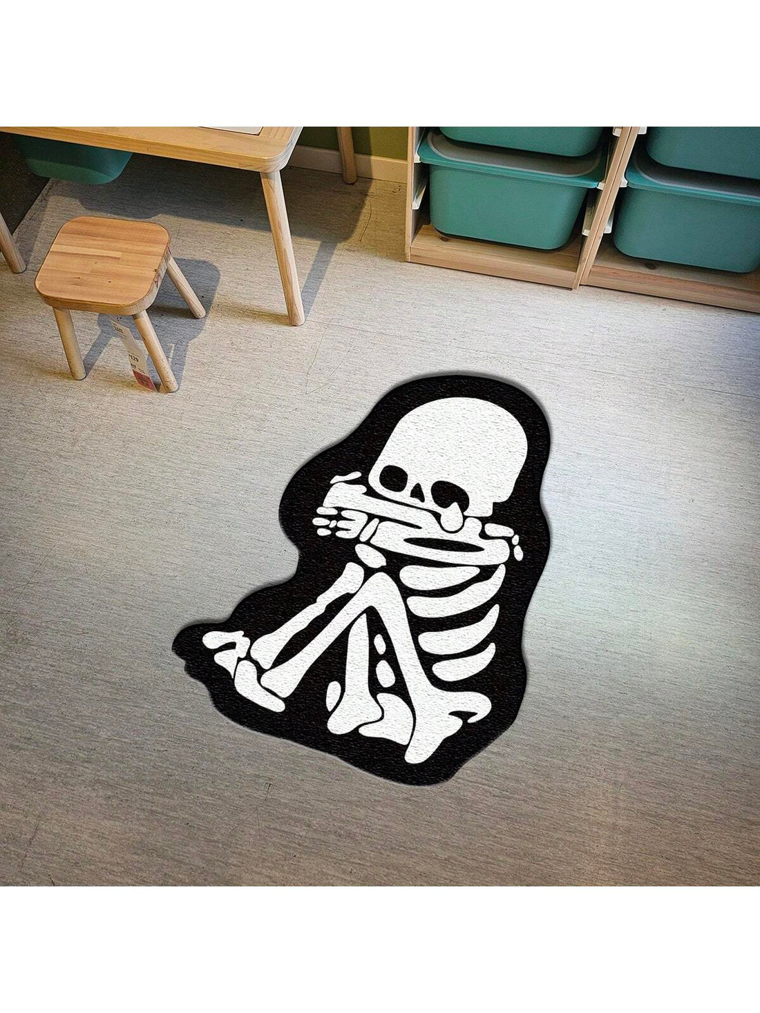 This Crybaby Skeleton Patterned Decorative Rug adds a spooky touch to your home decor. With a non-slip backing and wear-resistant design, this rug not only looks great but also provides practical benefits. The horror elements featured in the pattern add a unique and eerie vibe to any room.
