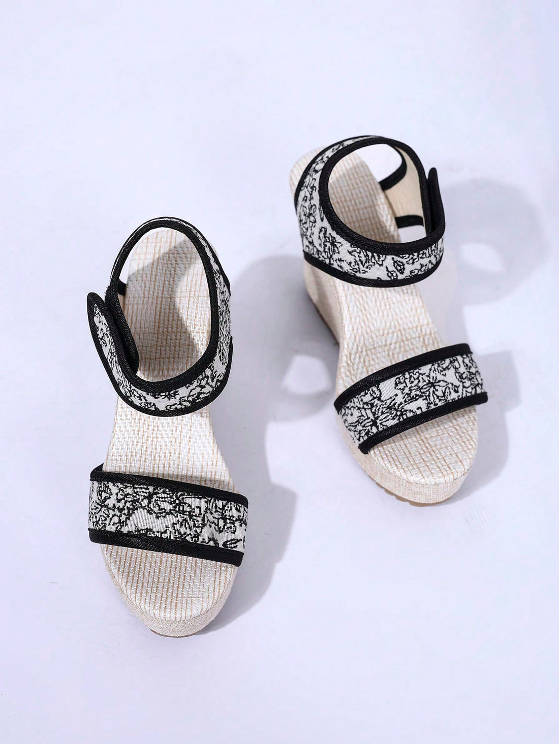 Elevate your outdoor adventures with our Random Printed Chunky Heel Sandals. These versatile sandals feature a unique random print that adds a touch of personality to any outfit. The sturdy chunky heel provides stability and support, perfect for exploring new terrain. 