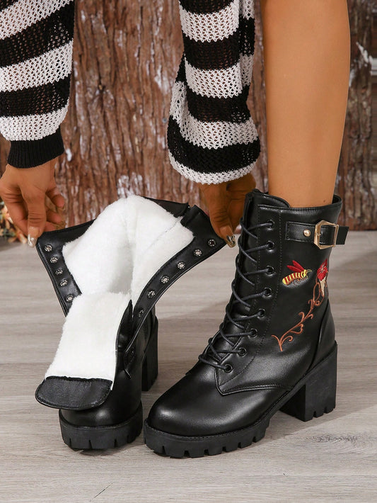 These black lace-up embroidered chunky heel boots offer a touch of motorcycle chic to any outfit. With a plus size design, they provide a comfortable and stylish option for those wanting an edgy look. The chunky heel offers stability while the lace-up design adds a touch of detail.