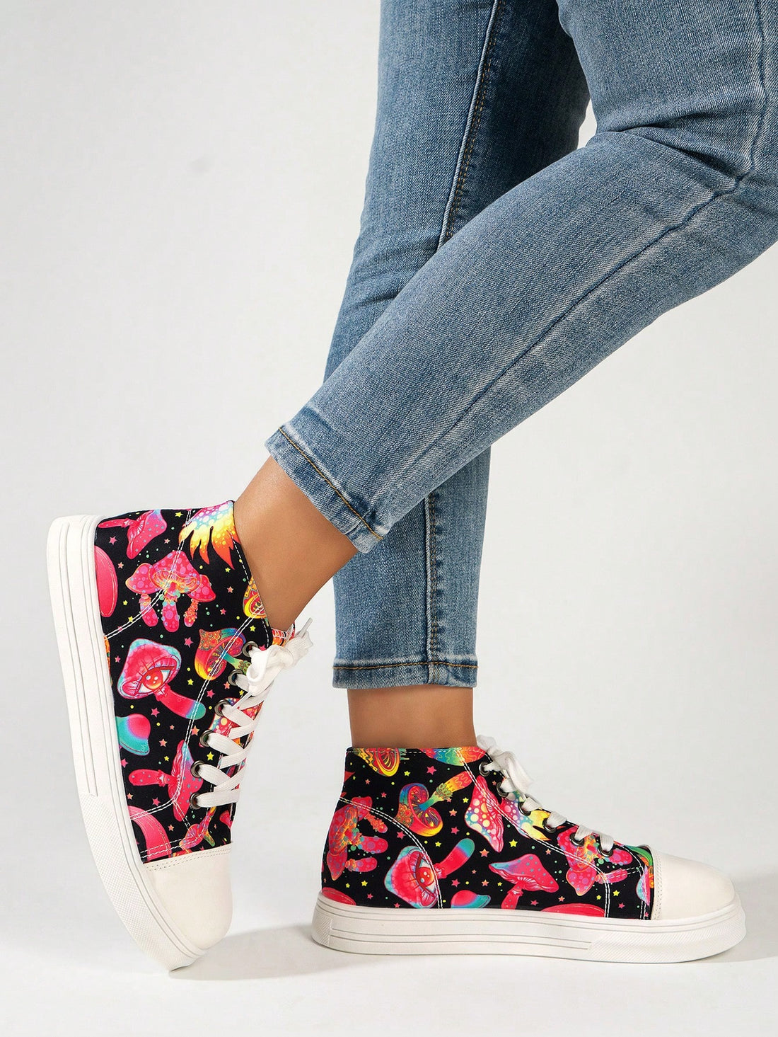 Enhance your Halloween spirit with our Doodle-licious Mid-Top Canvas Shoes for women. Fun and spooky, these sports shoes feature a unique doodle design, perfect for the holiday season. Enjoy both style and comfort as you celebrate with these festive shoes.