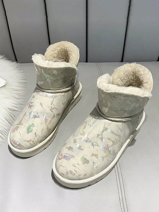 Bundle up in style and comfort with our Stay Cozy and Stylish Snow Boots. These Winter Fashion Must-Haves feature colorful fur for added warmth and a pop of color. Perfect for any cold weather adventure.