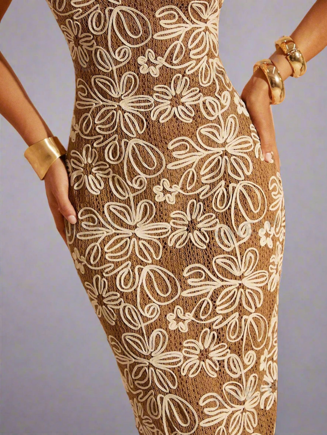 Achieve a stunning look with Ethereal Elegance: Spaghetti Strap Embroidery Mesh Dress. Its delicate spaghetti straps and intricate embroidered mesh fabric create a dreamy and elegant silhouette. Perfect for any special occasion, this dress is sure to make a statement.