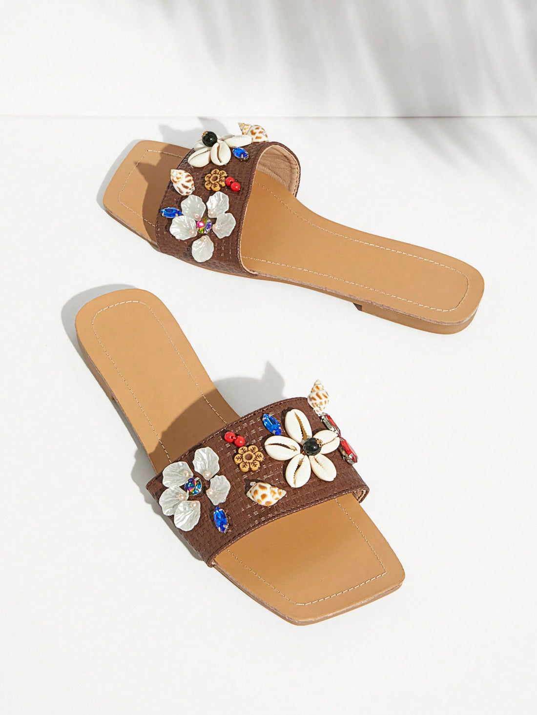 Experience the perfect blend of style and comfort with our Flower Power flat sandals. Designed for the summer season, these sandals feature a trendy floral design that will elevate any outfit. Made with high-quality materials, they offer a perfect fit and long-lasting wear. Step into summer with Flower Power.