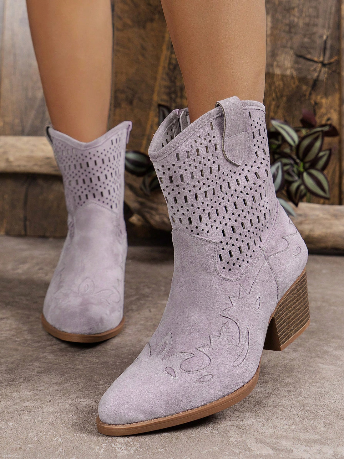 Elevate your style with our stylish lace-up ankle boots. Featuring comfortable wedge heels and a convenient side zipper, these boots are perfect for any occasion. The lace-up design adds a touch of sophistication, while the side zipper allows for easy on and off. Step up your fashion game with these must-have boots.