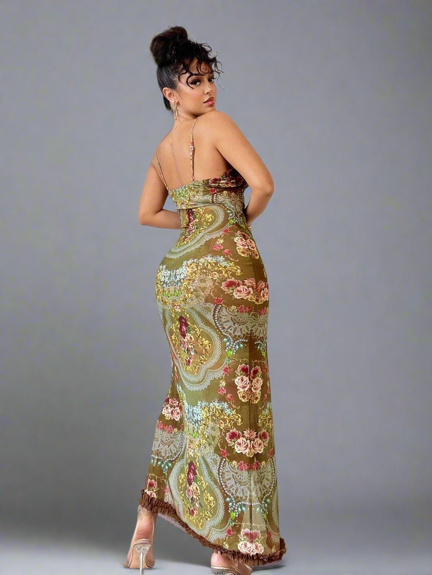 Floral Fantasy: Sleeveless Ruched Ruffle Hem Dress with Mesh Detail is the perfect combination of elegance and modern style. The intricate mesh detailing adds a touch of sophistication, while the ruched ruffle hem adds a playful flair. Made with high-quality fabric for a comfortable fit.