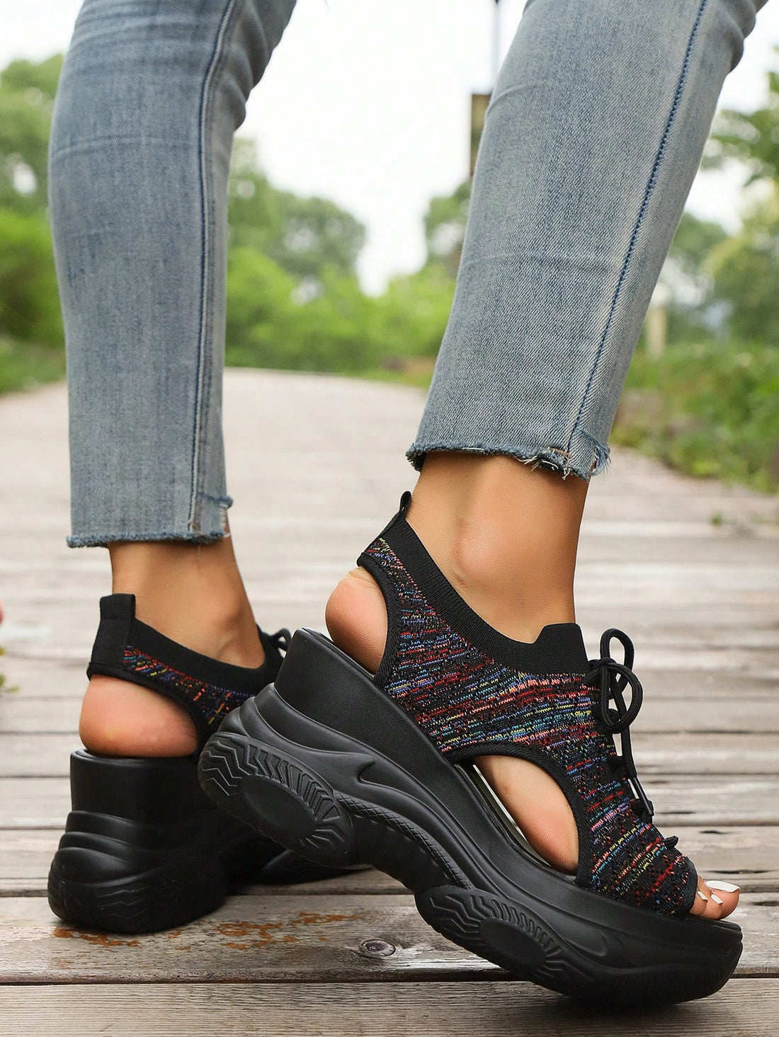 Elevate your fashion game with our Women's Thick-Soled Platform Sport Sandals. These stylish sandals feature a thick sole for added height and comfort. Perfect for any sporty or casual look, step up your style with these versatile sandals.