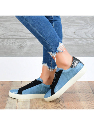 These stylish colorblock lace-up sneakers offer both fashion and comfort for women. With their unique design and sturdy laces, these shoes provide a secure and trendy fit. Perfect for any casual occasion, they are sure to elevate any outfit with their playful and comfortable style.