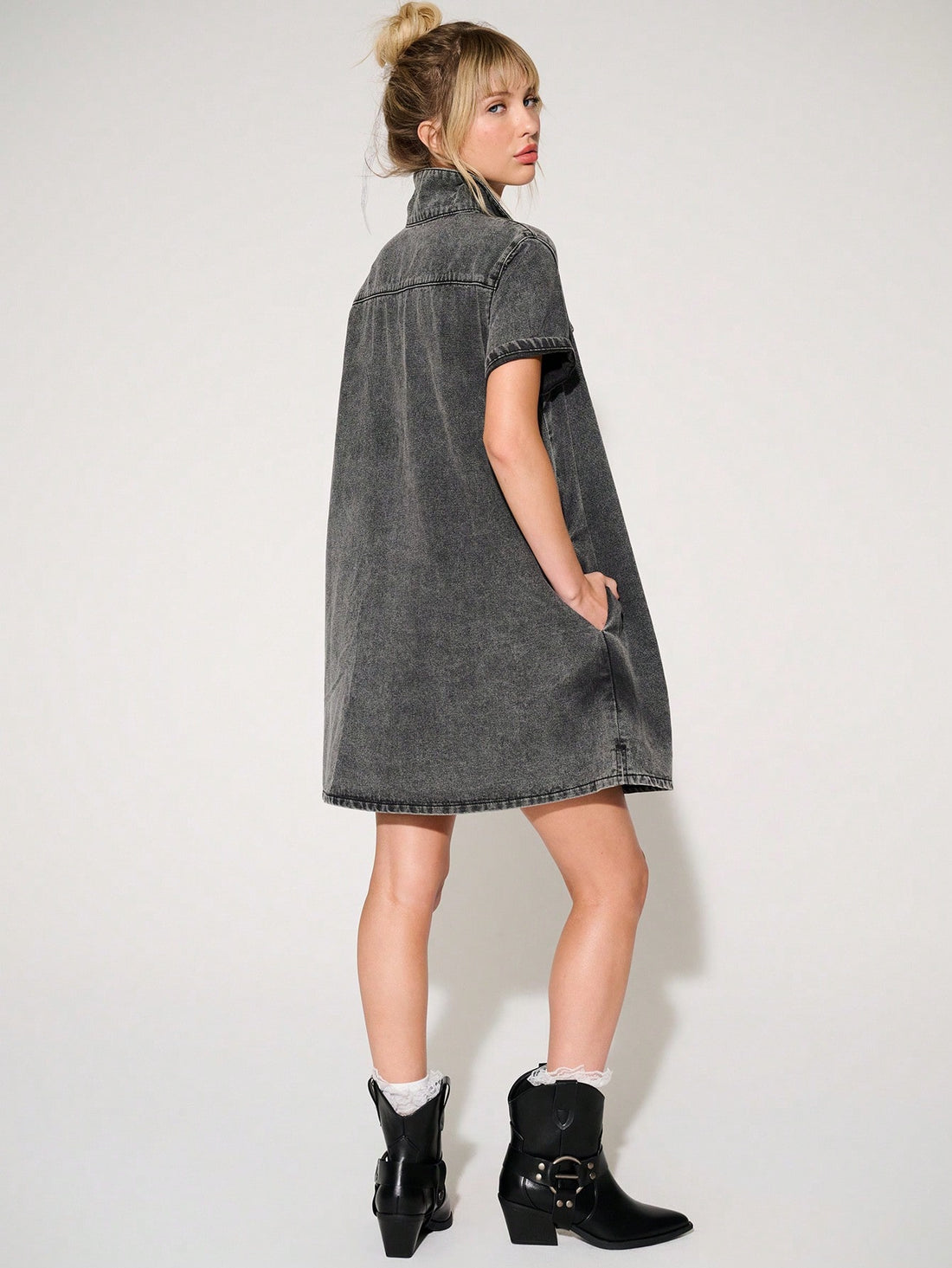 This Summer Denim Mini Shirt Dress is a must-have for the seasonal wardrobe. Made from high-quality denim, it offers a comfortable and stylish fit. Perfect for summer, it's versatile and easy to style. With its lightweight fabric and classic shirt dress design, it's a perfect choice for warm weather days.