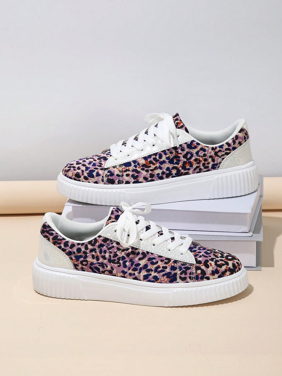 These Leopard Lace-Up Skate Shoes are perfect for all your festive and fashionable Christmas parties. With their eye-catching leopard print and chunky sneaker design, you'll be the talk of the town. Plus, the lace-up feature ensures a secure fit and comfortable wear all night long. Make a statement and elevate your style with these must-have shoes.