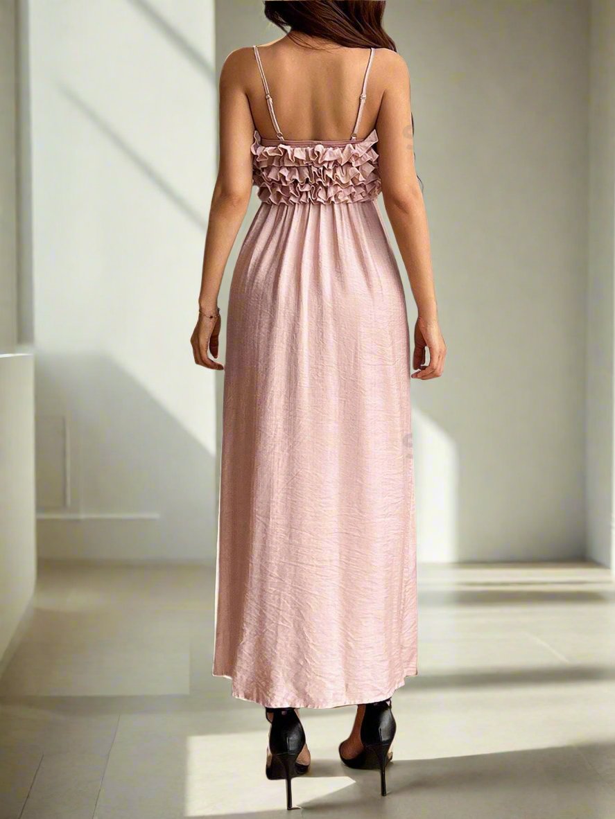 Elevate your summer wardrobe with our Ruffle Trim Sleeveless Cami Dress. Made from soft, breathable fabric, this dress flatters your figure with its fitted silhouette and adds a touch of femininity with delicate ruffle trim. Perfect for any occasion, this dress is your go-to for effortless summer style.