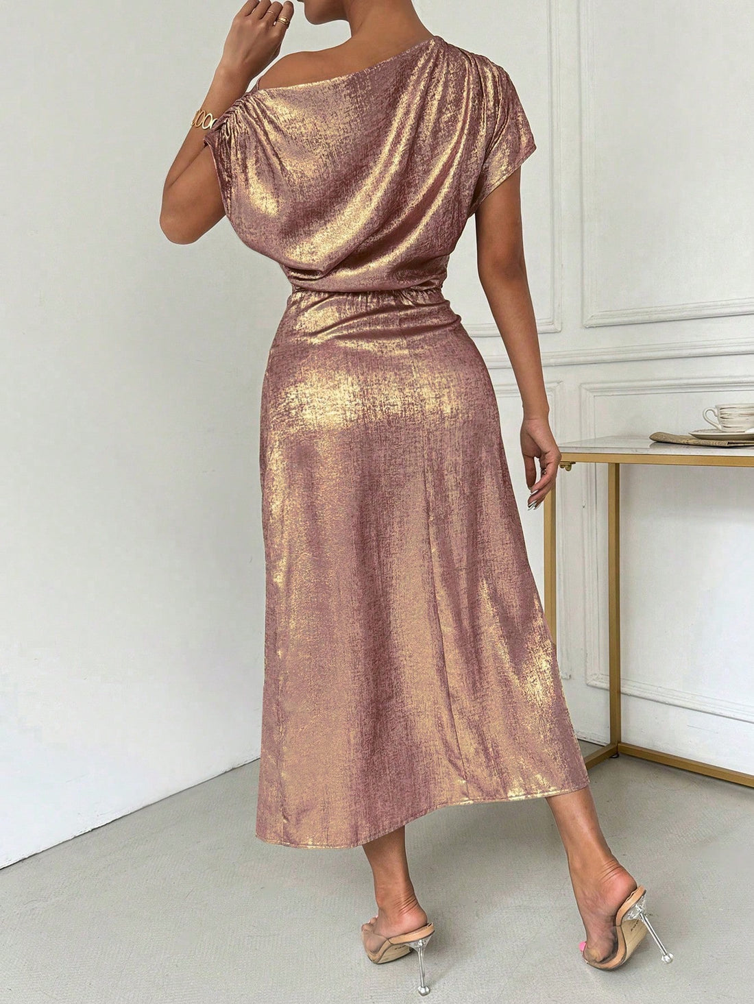 This Stunning Allurite Sequin Bodycon Dress features a zip back design and is perfect for glamorous nights. The alluring sequins add a touch of glamour, while the slim and sleek bodycon fit accentuates the figure. Make a statement at any event with this stunning dress.