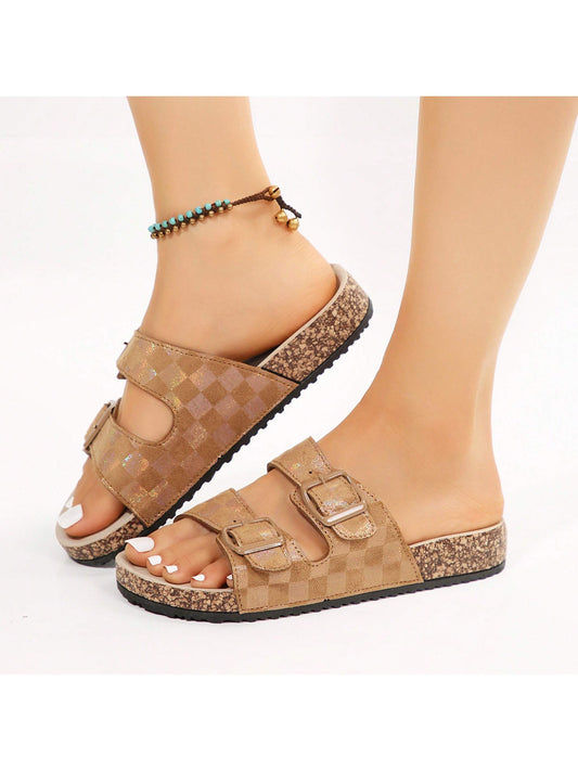 These Checkered Comfort Women's Double Buckle Flatform Slide Sandals offer a stylish yet comfortable choice for warm weather. The checkered pattern adds a fun touch to any outfit, while the double buckle straps provide a secure fit. The flatform design offers extra height without sacrificing comfort. Perfect for a day out or a casual evening.