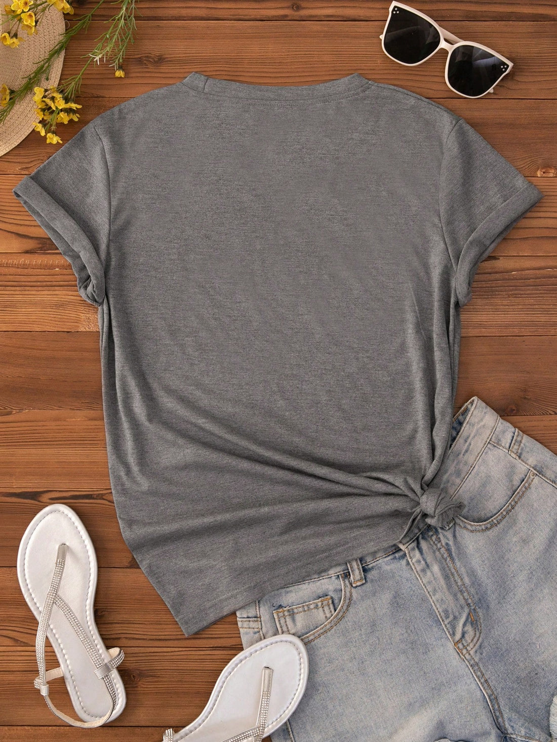 Add a touch of whimsy to your wardrobe with our Chic Cow Print T-Shirt! This trendy top boasts a playful cow pattern and short sleeves for a stylish look. Perfect for those who want to stand out from the herd. (See what we did there? Moo-ve over boring t-shirts!)