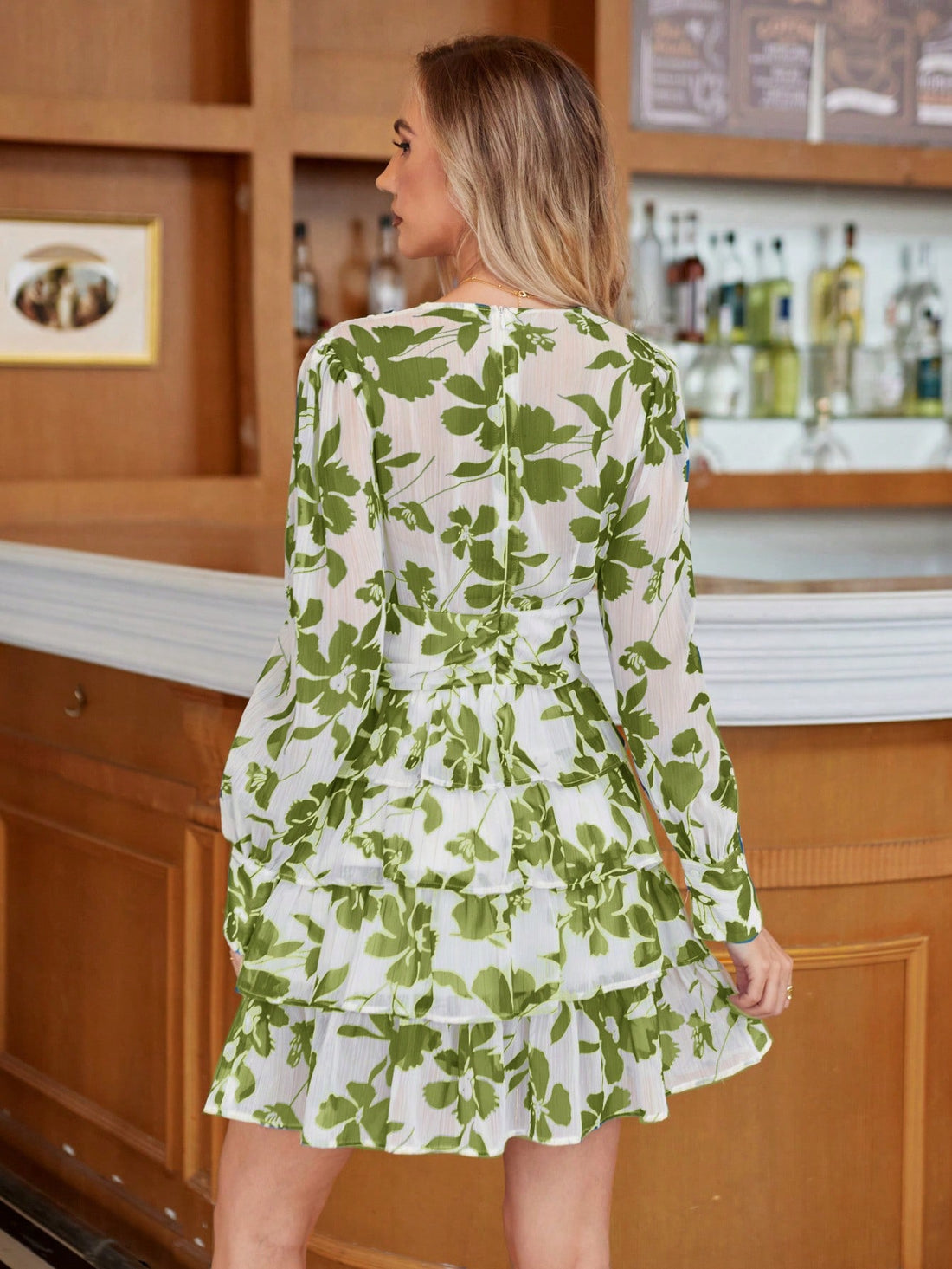 Get ready to turn heads on your next vacation in our Chic Aveloria Floral Print Long Sleeve Ruffle Hem Dress! With its playful print and flattering ruffle hem, this dress is perfect for vacation style. Don't forget to pack it in your suitcase for an effortless and chic look!