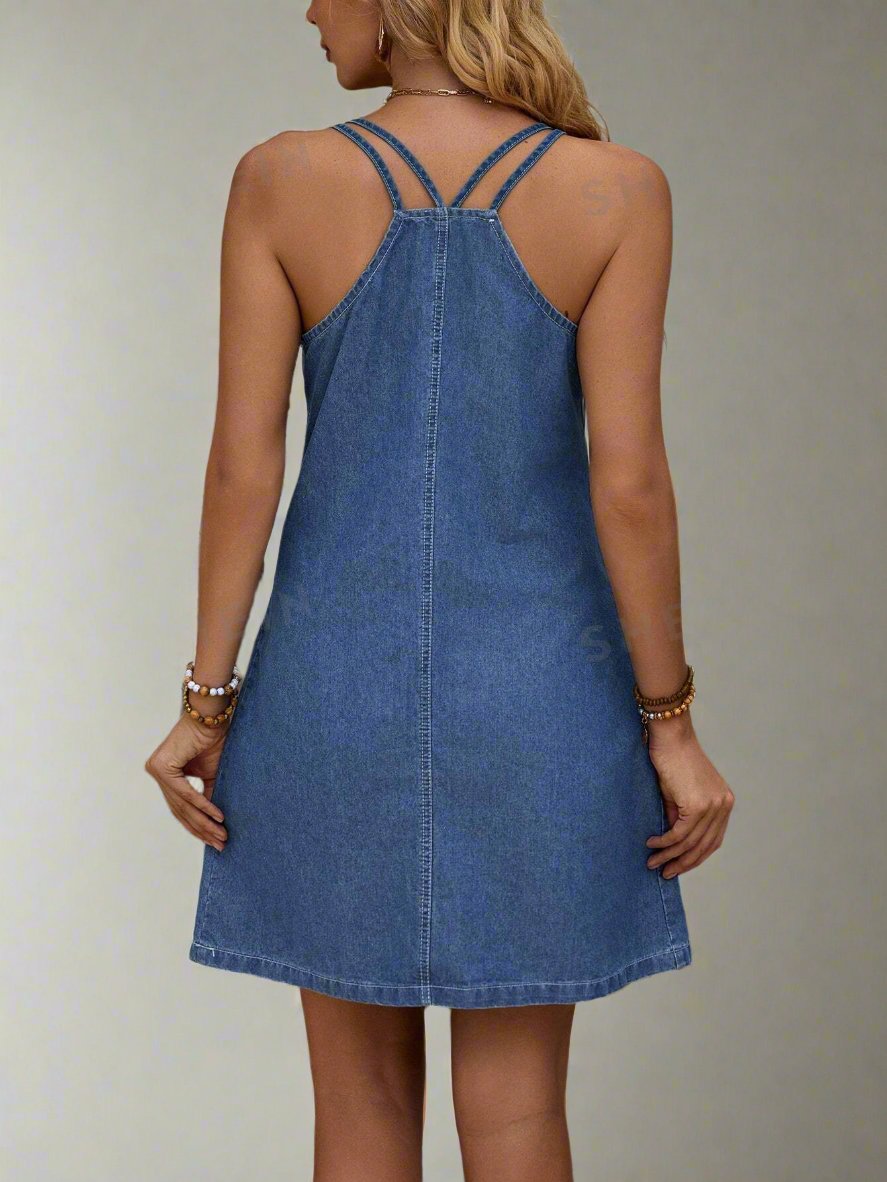 Achieve effortless style for every occasion with our Pocket Denim Cami Dress. Made from high-quality denim, this dress features a convenient pocket for a subtle yet functional touch. Perfect for any event, this versatile piece is a must-have in your wardrobe.