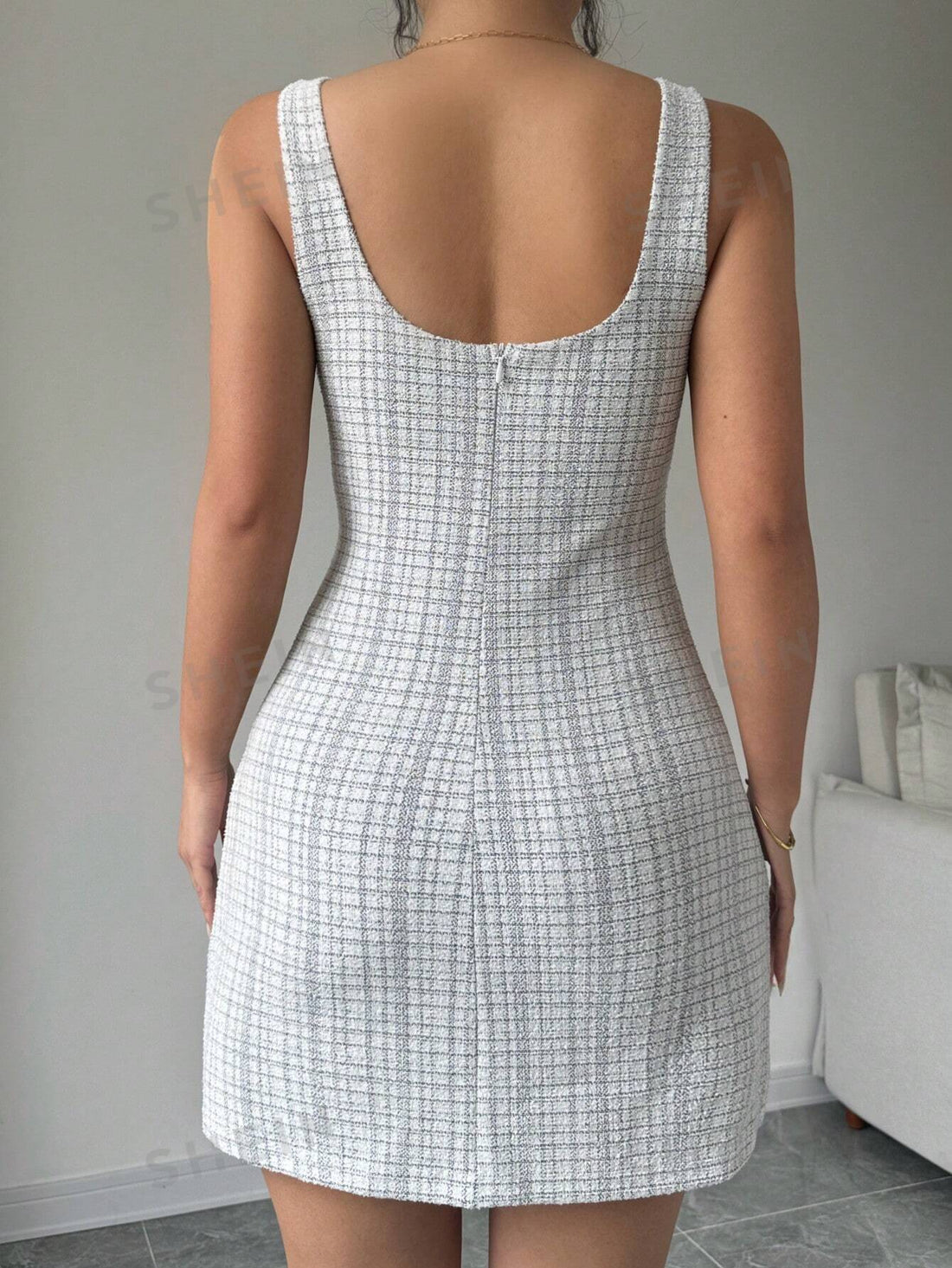 Elevate your style with the chic Plaid Print Zip Back Dress. This dress features a flattering plaid print and a convenient zip back for easy dressing. Perfect for any occasion, this dress will elevate your look with its timeless design.