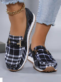 Step into style with our Stylish and Comfortable Black Plaid Plus Size Slip-On Sneakers for Women. These elegant shoes feature a sophisticated chain design, adding a touch of glamour to your everyday look. Designed with comfort in mind, these sneakers are perfect for all-day wear.