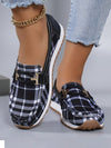 Step into style with our Stylish and Comfortable Black Plaid Plus Size Slip-On Sneakers for Women. These elegant shoes feature a sophisticated chain design, adding a touch of glamour to your everyday look. Designed with comfort in mind, these sneakers are perfect for all-day wear.