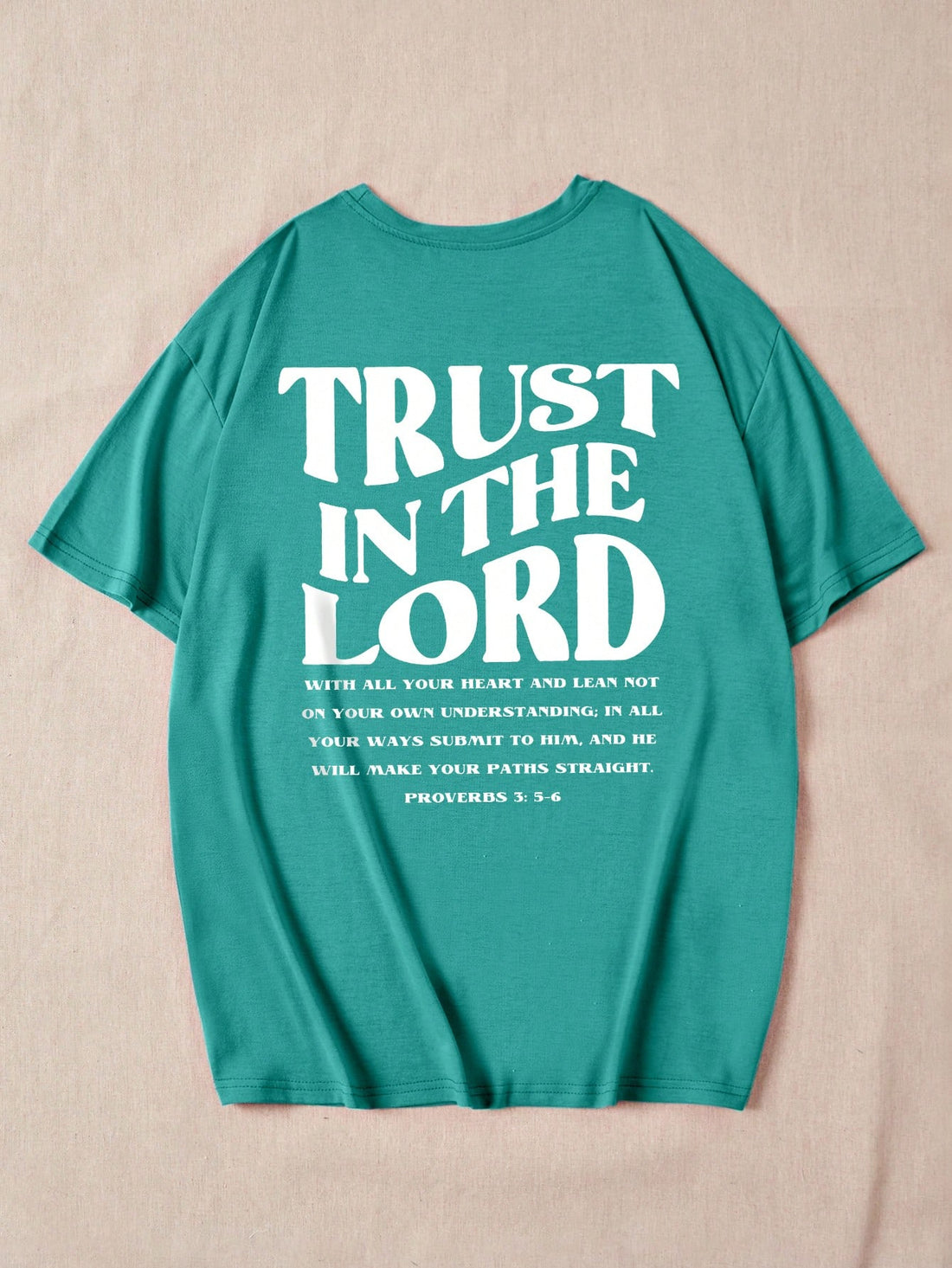 Show off your faith with our Faith-Inspired Summer Tee! This unique Trust in the Lord Graphic Drop Shoulder T-Shirt will keep you cool and stylish all season long. Trust in the Lord and look good doing it!