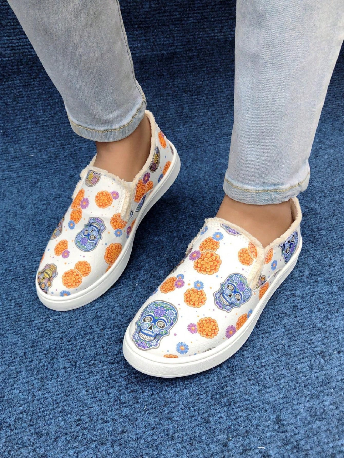 These Spooky Chic Halloween Canvas Slip-On Sneakers are the perfect addition to your fall wardrobe. Not only are they stylish and on-trend with their Halloween-themed design, but they are also incredibly comfortable and breathable, making them ideal for all-day wear. 